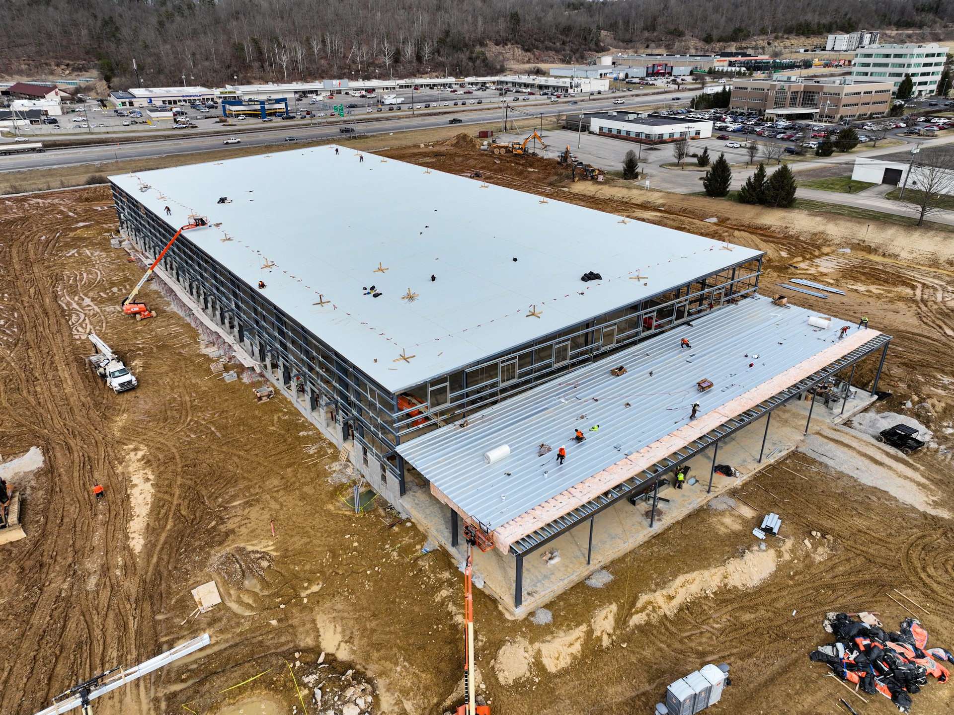 Bird's-eye view of the foundational groundwork of a vast industrial facility